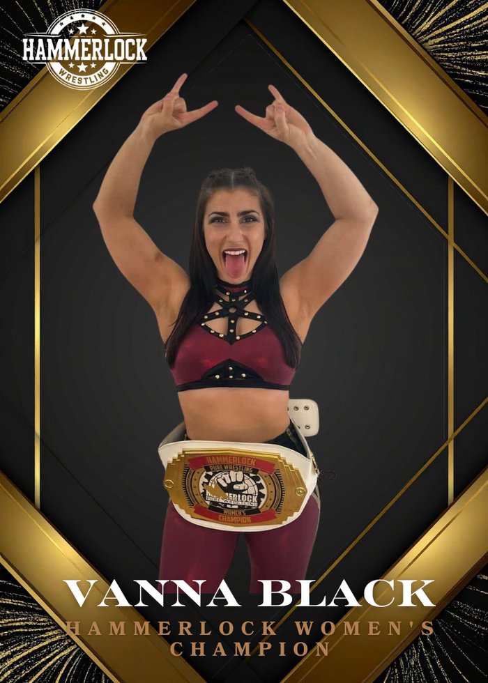 Vanna Black, Hammerlock Wrestling Women's Champion, holding the championship belt